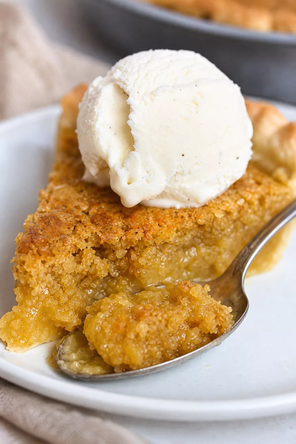 Homemade Amish Oatmeal Pie close-up serving shot