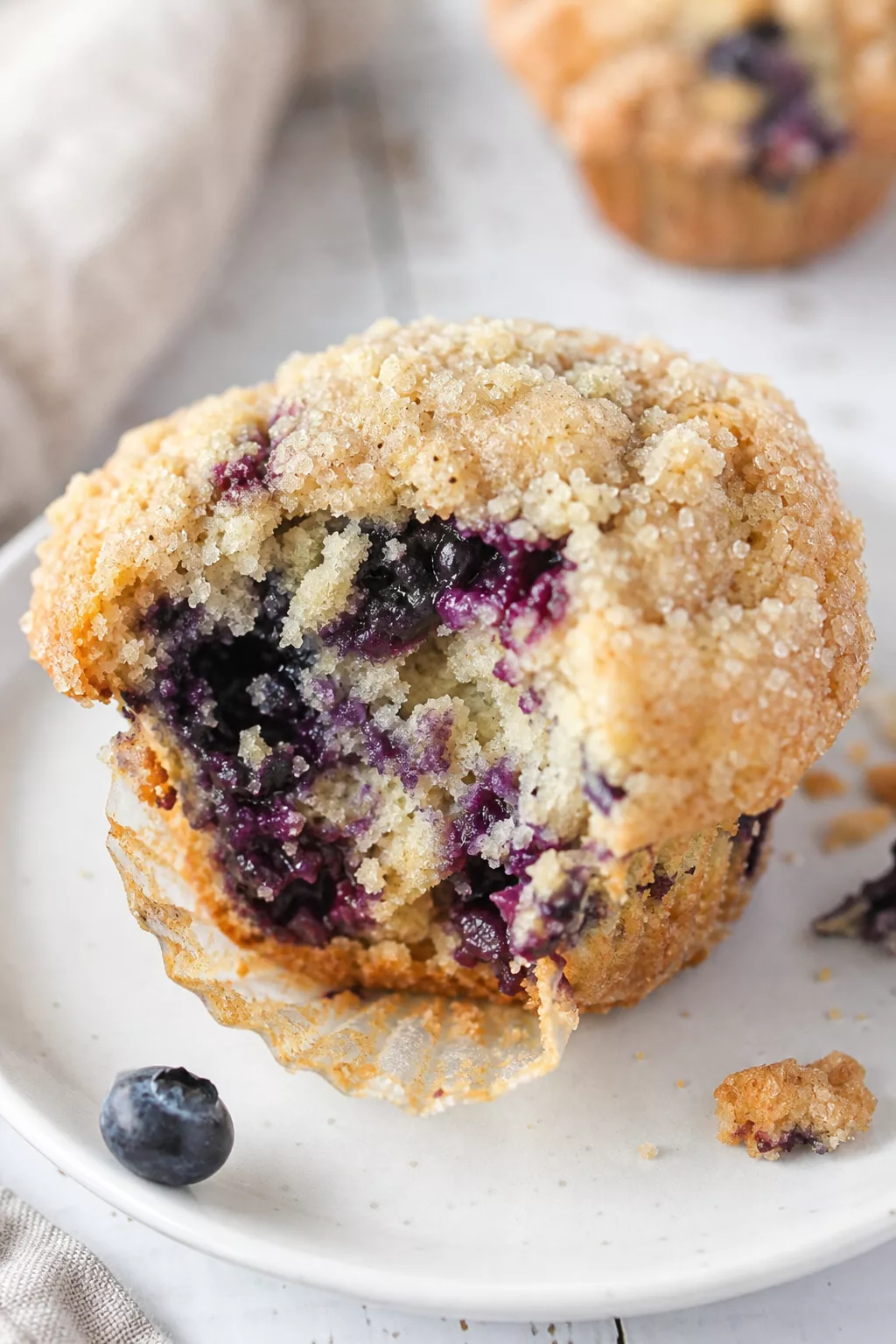 Homemade Blueberry Muffins close-up serving shot