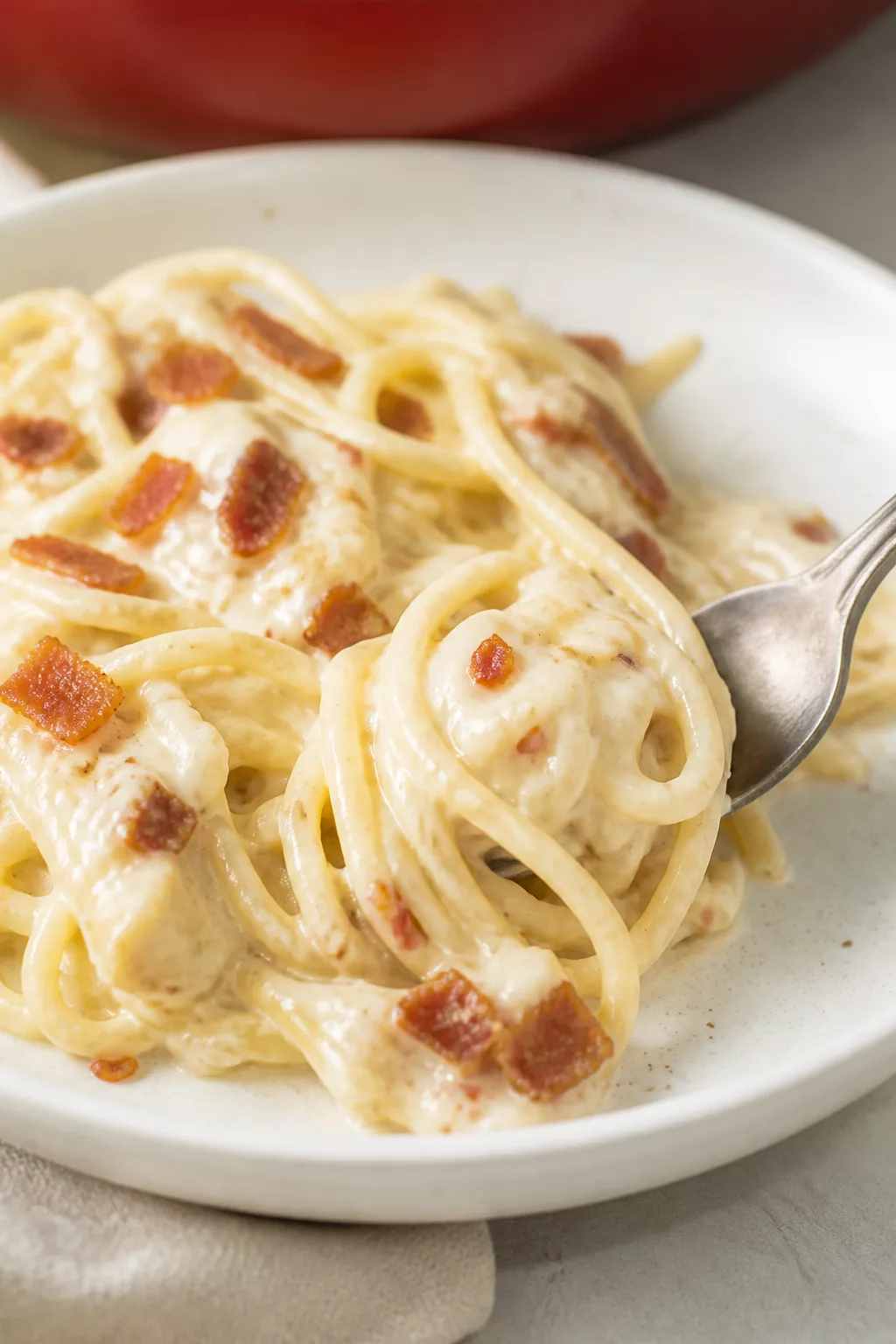 Creamy Bacon and Spaghetti Bake close-up serving shot