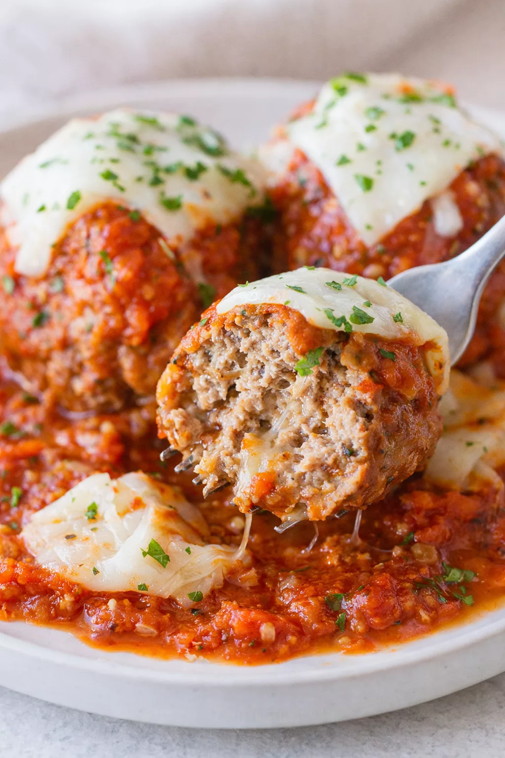 Slow-Cooker Meatballs in Marinara Sauce close-up serving shot