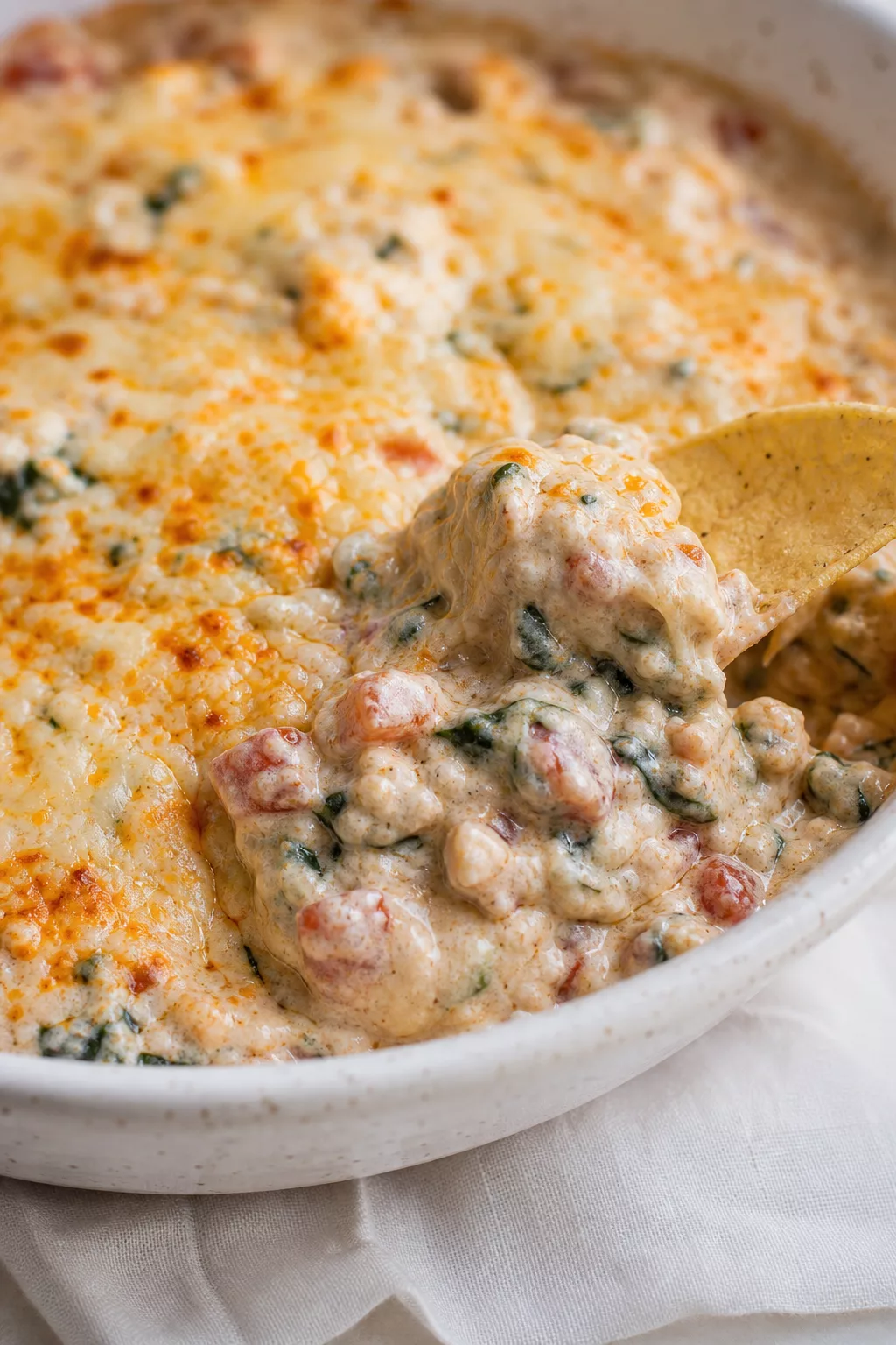 Spinach and Artichoke Boat Dip close-up serving shot